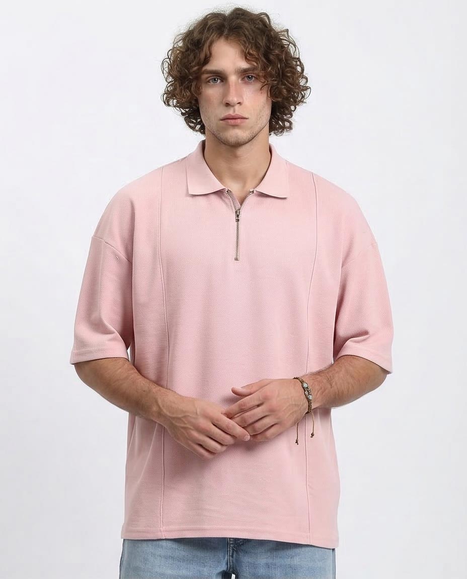 Man wearing a pink short-sleeve jacket on a white background