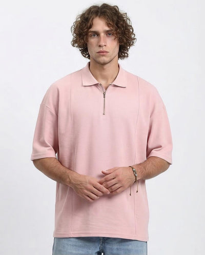 Man wearing a pink short-sleeve jacket on a white background