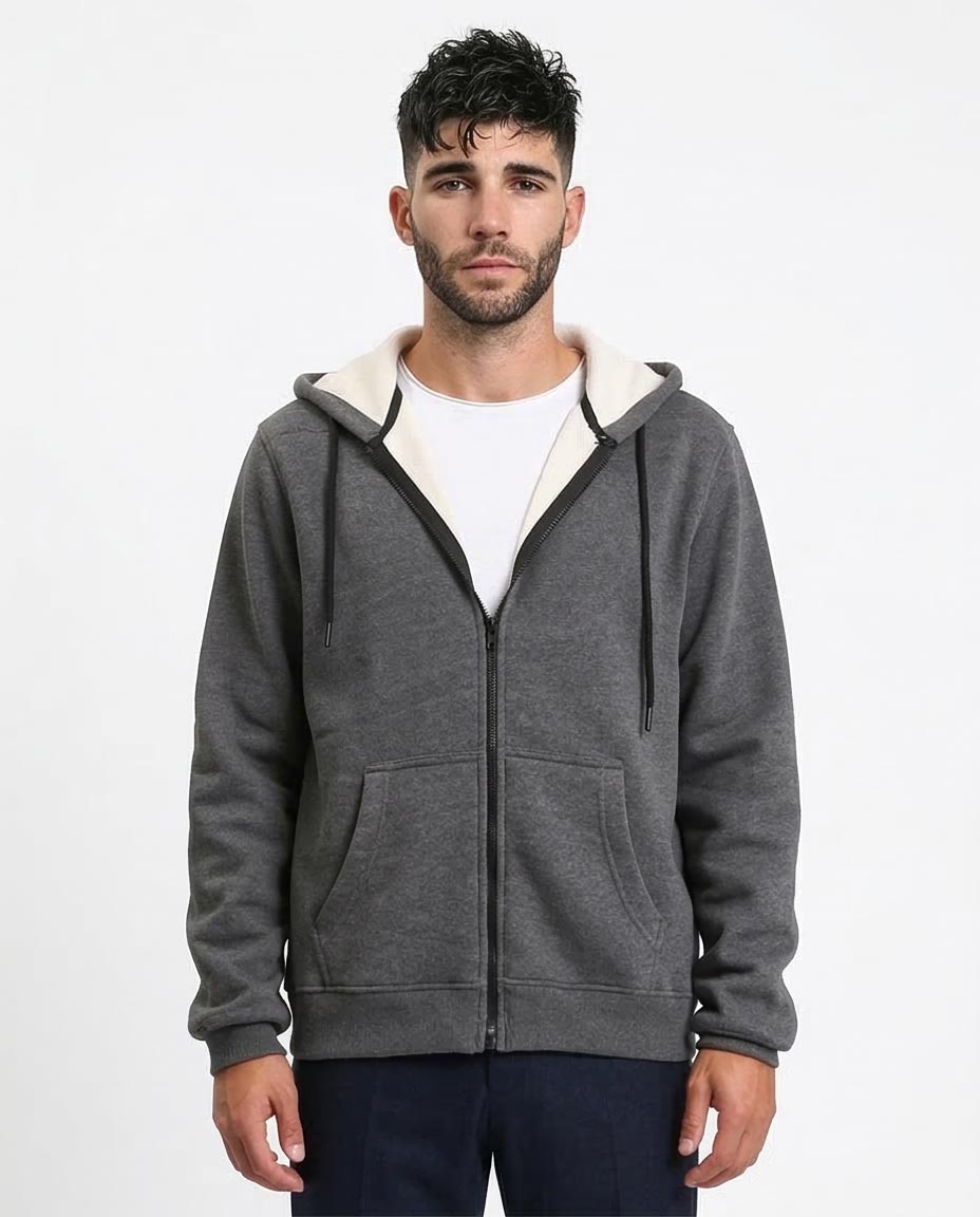 Man wearing a gray hoodie with a white interior on a white background