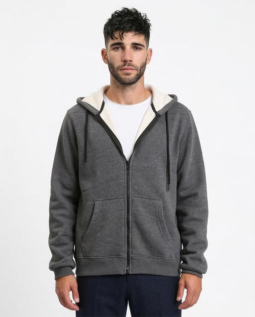 Man wearing a gray hoodie with a white interior on a white background