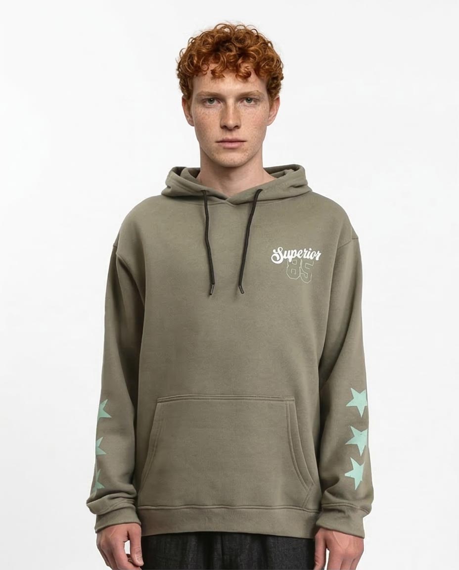 Man wearing a green hoodie with a brand logo on a white background