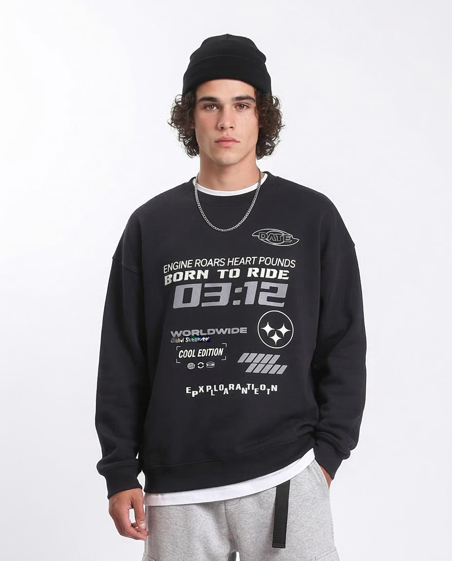 Person wearing a black sweatshirt with text and graphics on a white background