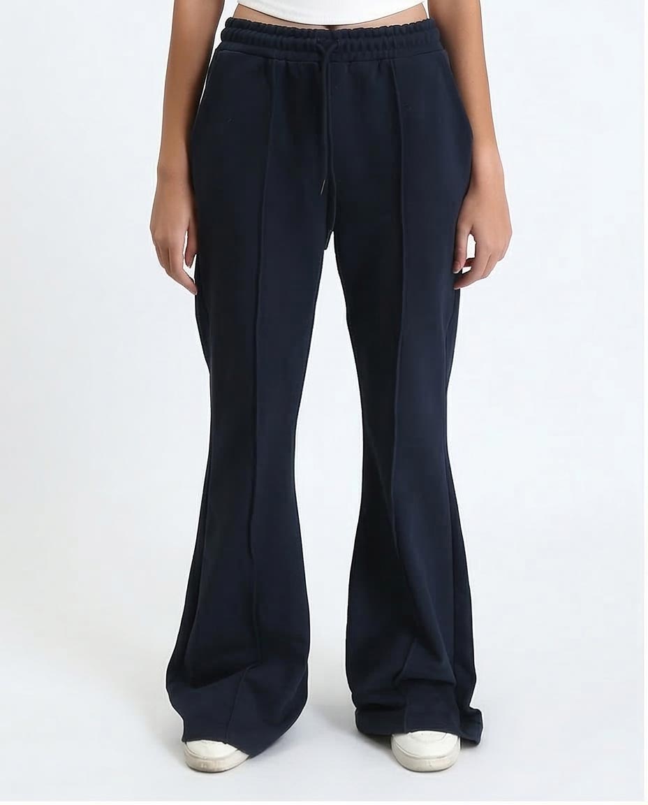 Navy blue wide-leg pants worn by a person on a white background