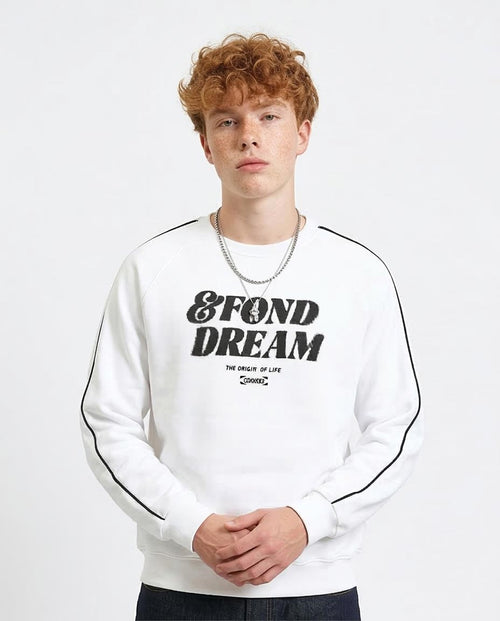 Person wearing a white sweatshirt with black text on a plain background