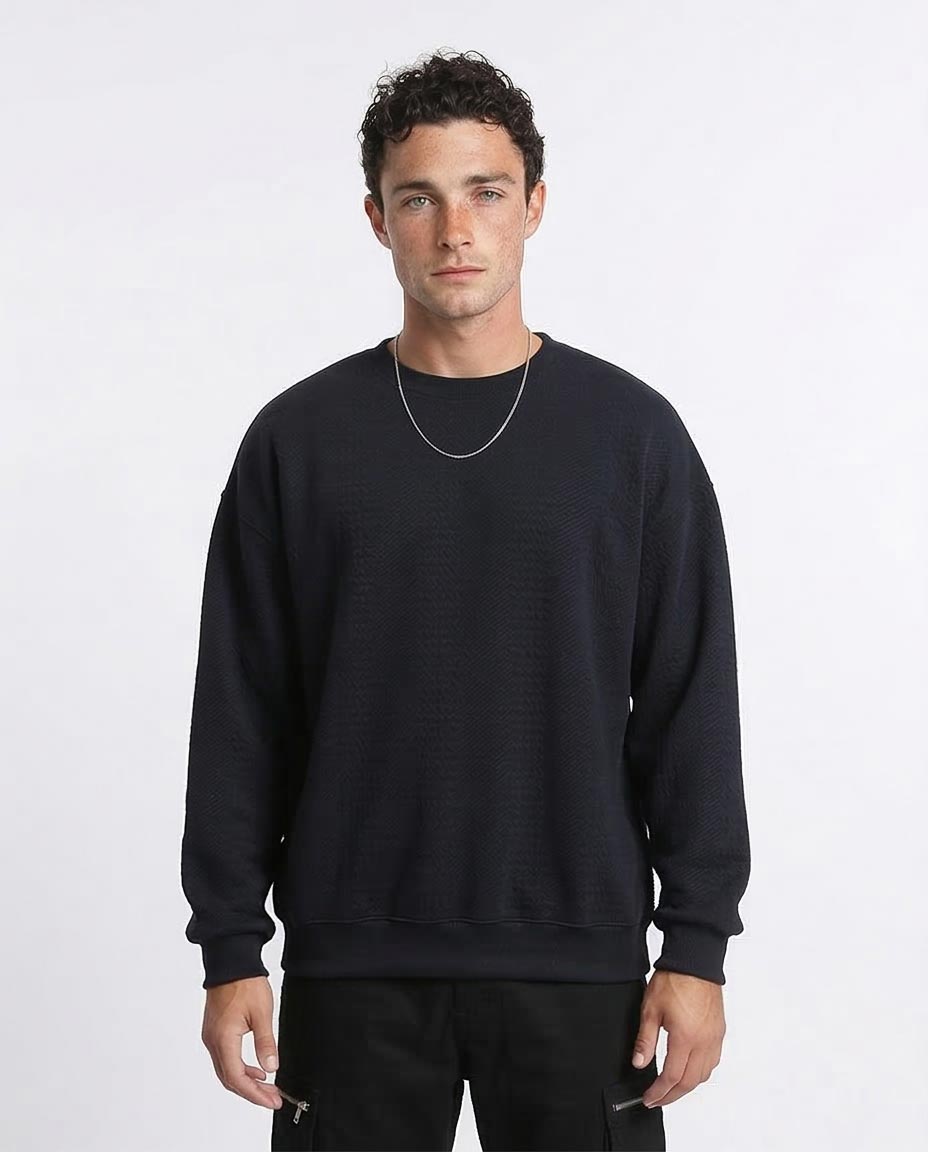 Man wearing a black sweatshirt on a white background