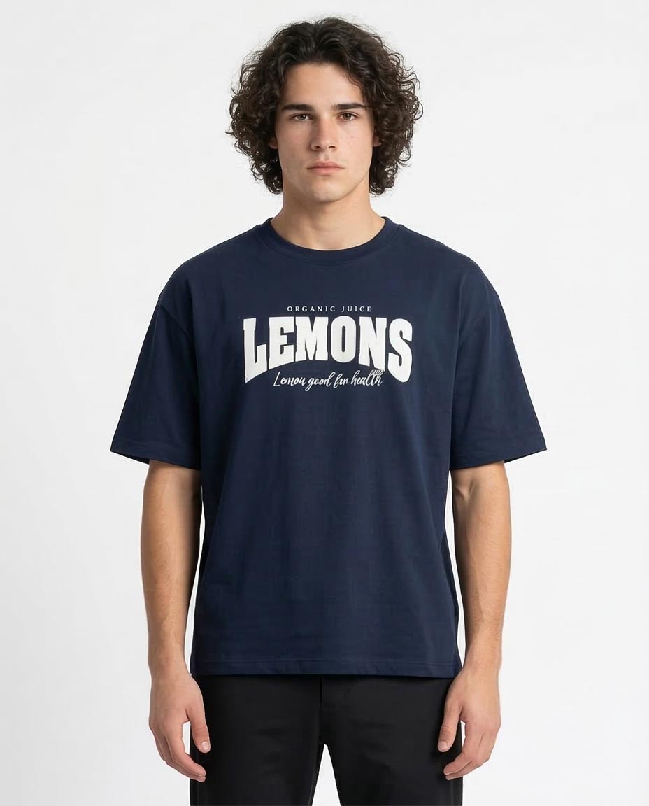 Man wearing a navy blue t-shirt with 'LEMONS' text on a white background